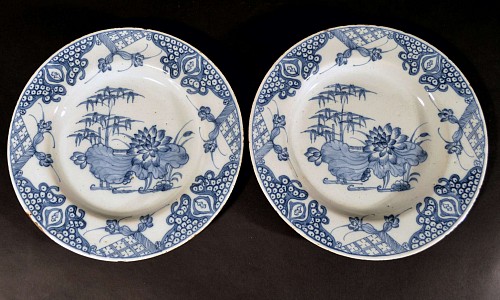 Inventory:  British Delftware, English Delftware Plates decorated in Underglaze Blue with Lotus Flowers, Probably London, Circa 1760, SOLD •