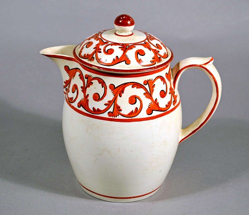 Creamware Pottery Creamware Covered Jug and Cover with Orange Foliate Scroll Designs, Circa 1820 $650