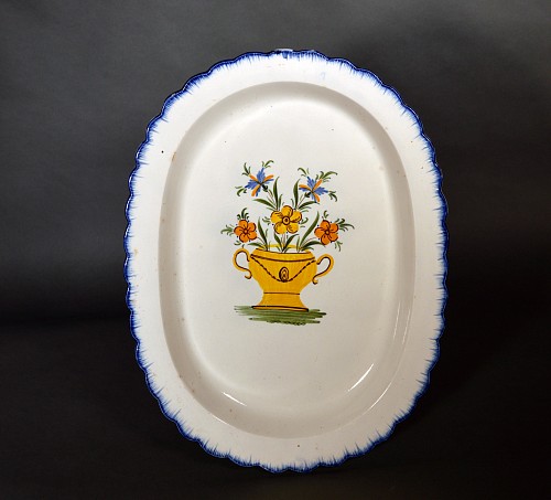 Inventory:  Pearlware, Shell-edge Prattware Oval Pearlware Dish painted with An Urn of Flowers, 1800-20, $2,000