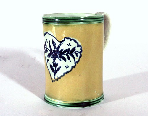 Search:  Pearlware, Pearlware Mug with Rare Yellow Slip Ground and Heart Decoration, 1780, $1,850