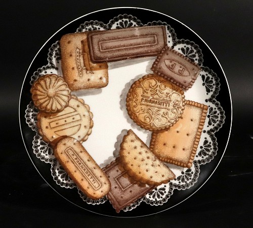 Piero Fornasetti Piero Fornasetti Biscotti Pattern Porcelain Plate, Trompe l'oeil Cookies, Number 6 in series, Circa 1960 $750