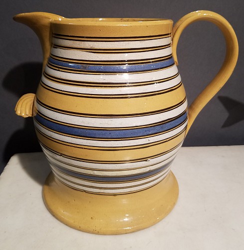 Mocha Mocha Large Multi-Slip-banded Yellow Ware Jug, Circa 1840 $4,500