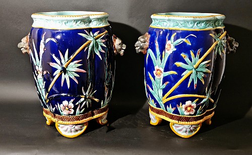 French Faience Dramatic Pair of French Majolica Urns with Stork and Wolf's Head Handles, 1880 $7,500