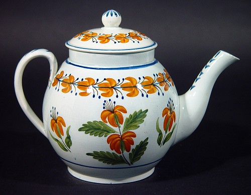 Inventory:  Pearlware, Antique English Prattware Pearlware Teapot decorated with Orange Flowers, Circa 1810-20, $950