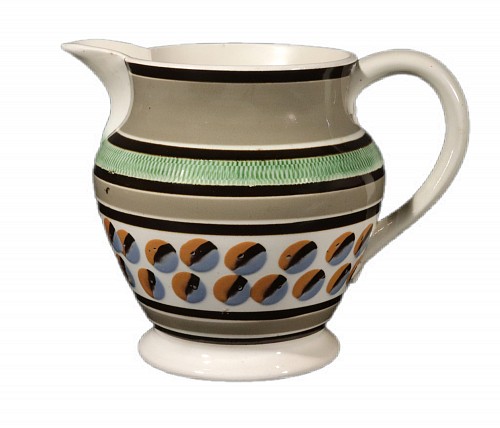 Mocha English Pearlware Mocha Pottery Jug with Cat's Eye Design, 1820 $2,500