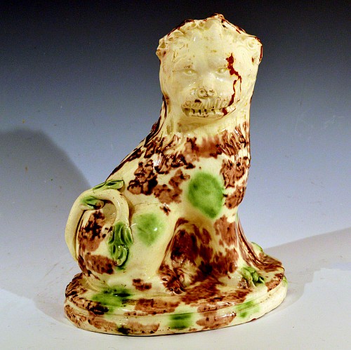 Inventory:  Creamware Pottery, English Pottery Whieldon Tortoiseshell Seated Lion, Circa 1775, $3,750
