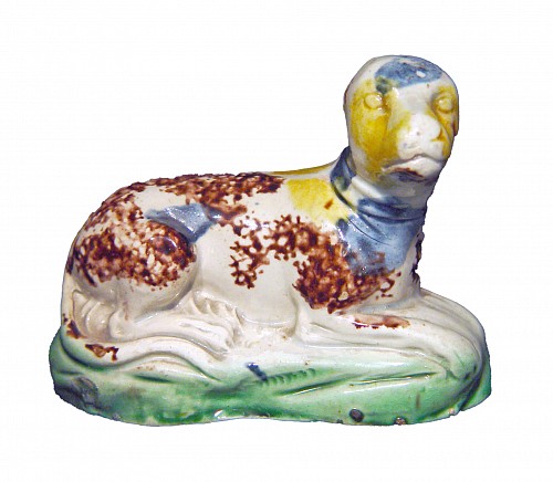Inventory:  Creamware Pottery, 18th-century English Creamware Whieldon-type Pottery Figure of a Recumbent Dog, Circa 1775, $1,800