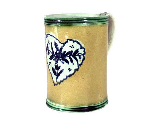 Pearlware English Pottery Yellow Slip-Ground Pearlware Mug with Reserved Heart, 1800 $1,850