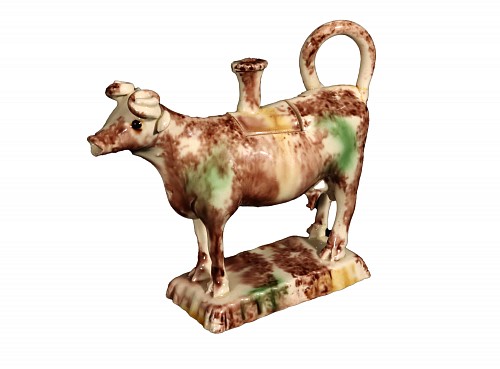 Creamware Pottery 18th-century Creamware Whieldon Type Cow Creamer and Cover, 1770 $3,900